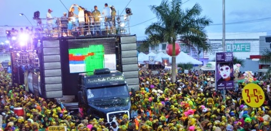 A trio electrico drives through the crowd at feira de santana.